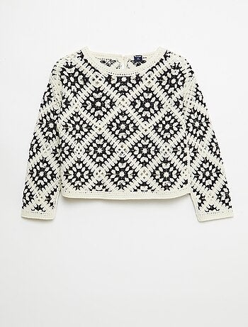 Pull en maille ajourée avec broderies fleurs