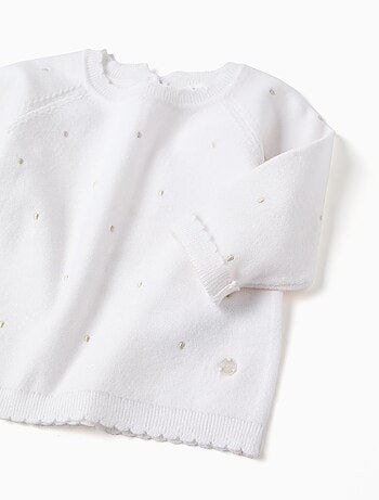 Pull en maille avec bordure ondulée