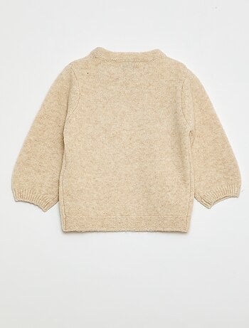 Pull en maille avec broderies