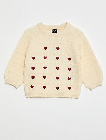 Pull en maille avec broderies