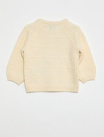 Pull en maille avec broderies