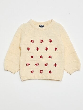 Pull en maille avec broderies