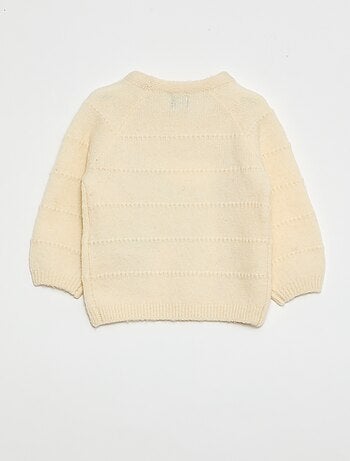 Pull en maille avec broderies
