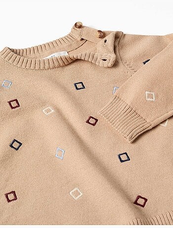 Pull en maille avec carrés brodés