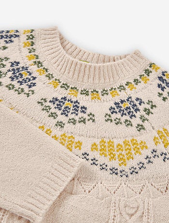 Pull en maille avec jacquard et détails torsadés