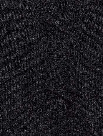 Pull en maille avec ouverture par nœuds