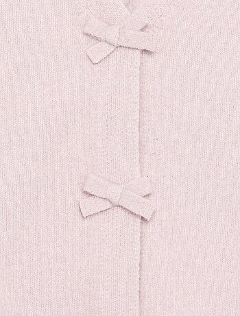 Pull en maille avec ouverture par nœuds
