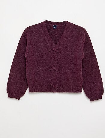 Pull en maille avec ouverture par nœuds
