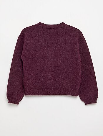 Pull en maille avec ouverture par nœuds