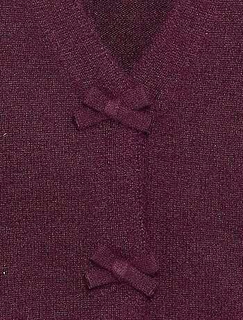 Pull en maille avec ouverture par nœuds