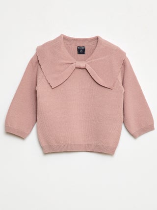 Pull en maille avec un large nœud fantaisie devant