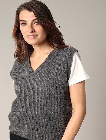 Pull en maille côtelée sans manches
'Deeluxe'