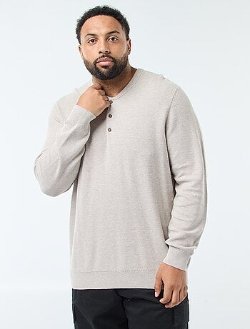 Pull en maille piquée avec col rond boutonné