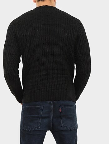 Pull en maille torsadée