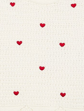 Pull en tricot avec broderies 'cœurs'