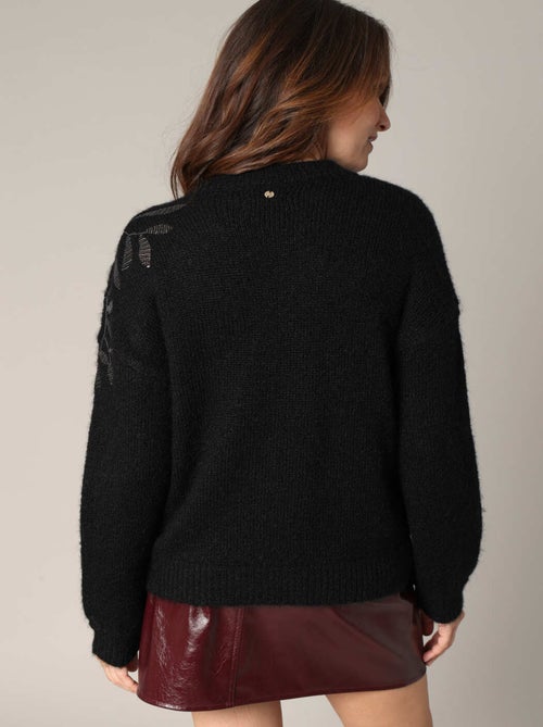 Pull en tricot orné de broderies florales à paillettes 'Deeluxe' - Kiabi