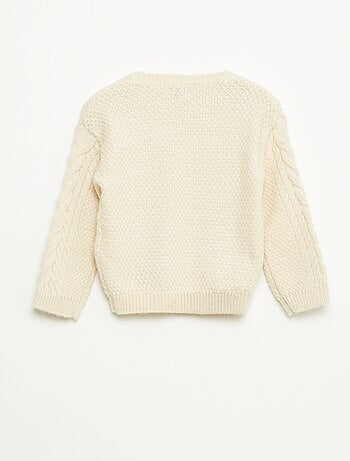 Pull en tricot torsadé