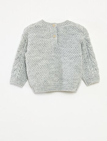 Pull en tricot torsadé