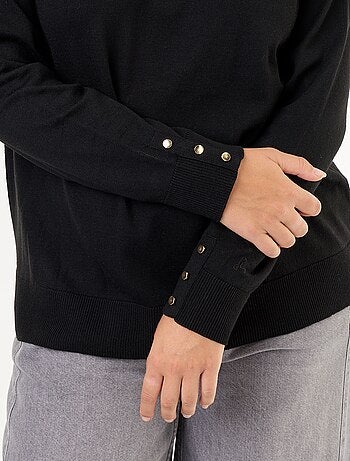 Pull uni à col roulé