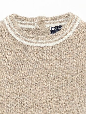 Pull uni avec bords contrastés