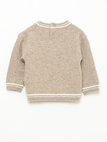 Pull uni avec bords contrastés