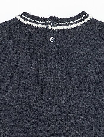 Pull uni avec bords contrastés