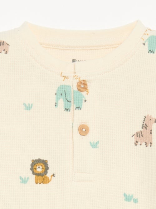 Pyjama 2 pièces - T-shirt à manches longues + pantalon - Kiabi Pyjama 2 pièces - T-shirt à manches longues + pantalon - Kiabi