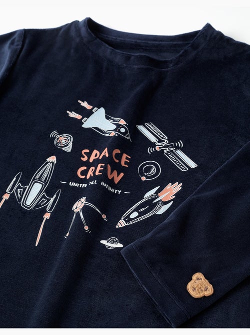 Pyjama en velours avec imprimé espace qui brille dans le noir - Kiabi Pyjama en velours avec imprimé espace qui brille dans le noir - Kiabi