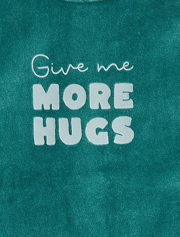 Pyjama en velours avec pieds et animation devant