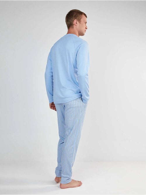 Pyjama homme long de snoopy en interlock - Kiabi Pyjama homme long de snoopy en interlock - Kiabi