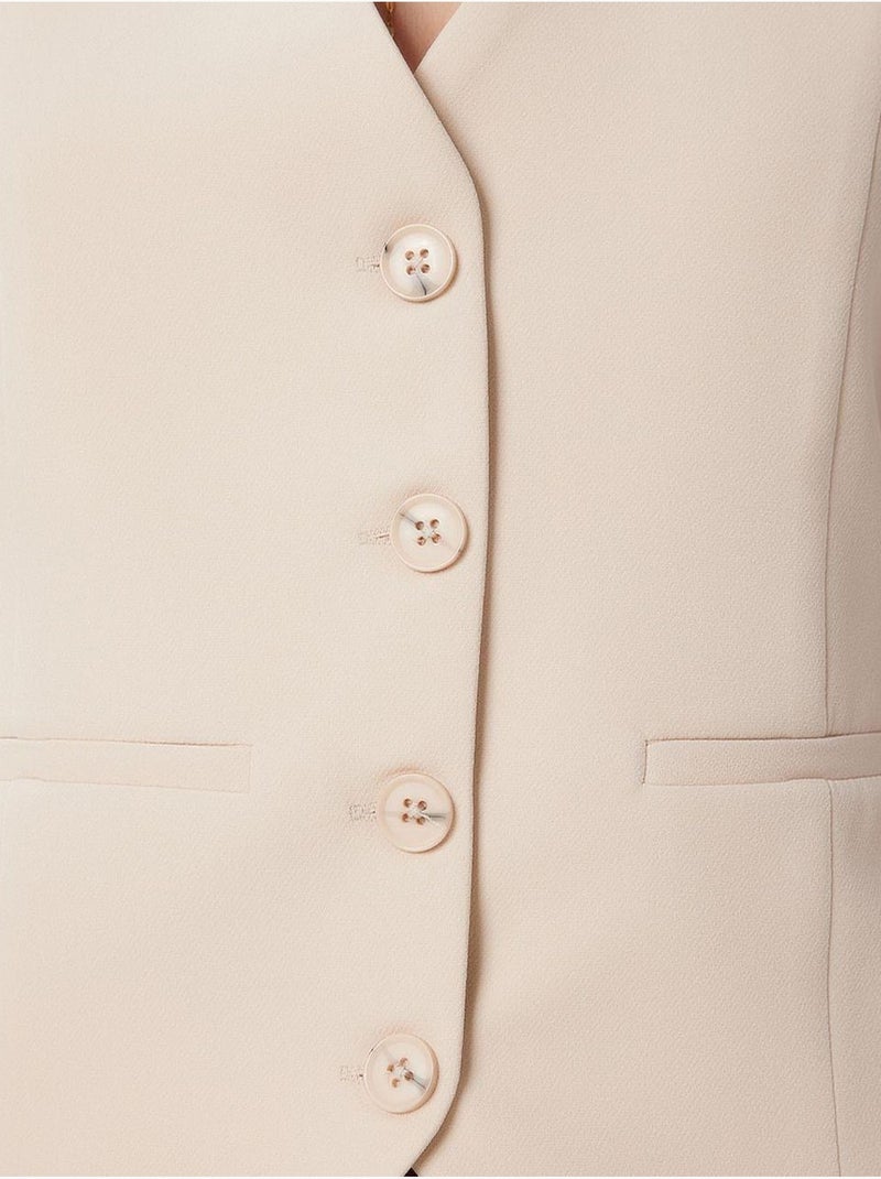 Ravissant gilet court boutonné à col en v istanbul Crème - Kiabi