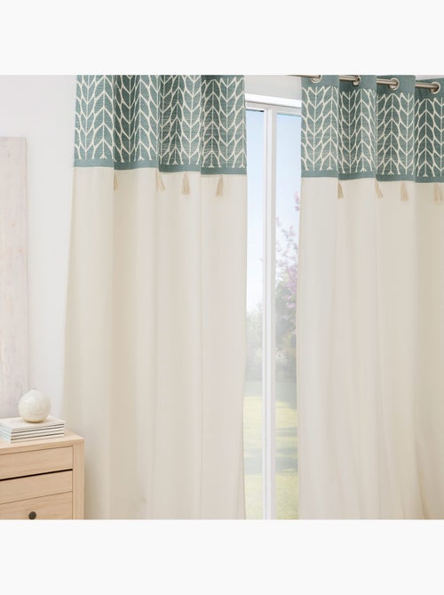 Rideau tamisant à œillets en polycoton jacquard avec pompons - Kiabi Rideau tamisant à œillets en polycoton jacquard avec pompons - Kiabi