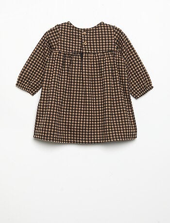 Robe à carreaux et manches longues