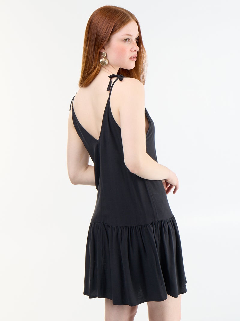 Robe courte avec fines bretelles et base volantée Noir - Kiabi