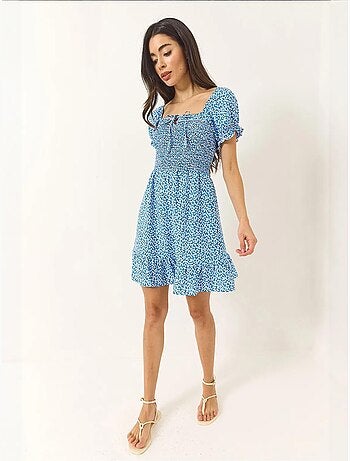 Robe courte en viscose guipure à manches bouffantes et motifs marguerites bianco lucci