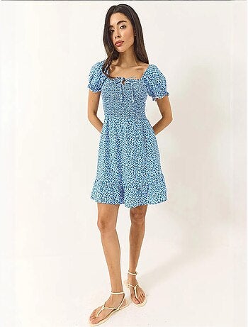 Robe courte en viscose guipure à manches bouffantes et motifs marguerites bianco lucci