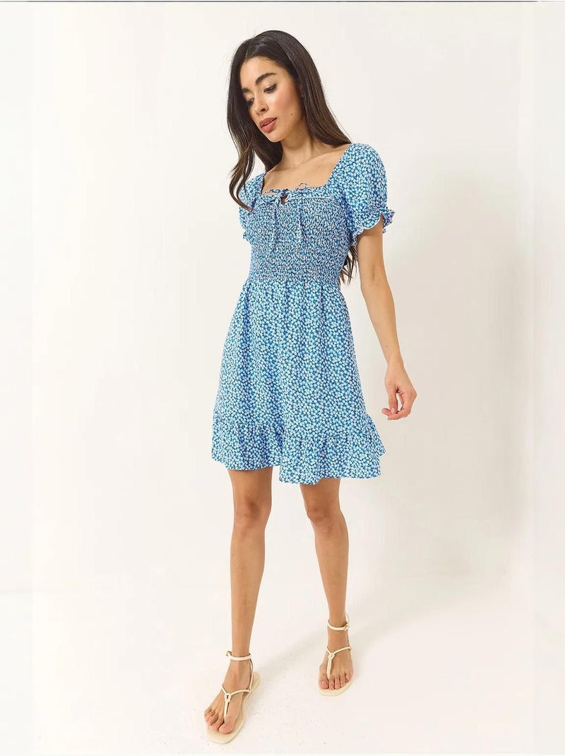Robe courte en viscose guipure à manches bouffantes et motifs marguerites bianco lucci Bleu clair - Kiabi