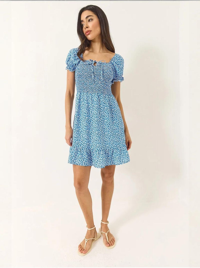 Robe courte en viscose guipure à manches bouffantes et motifs marguerites bianco lucci Bleu clair - Kiabi
