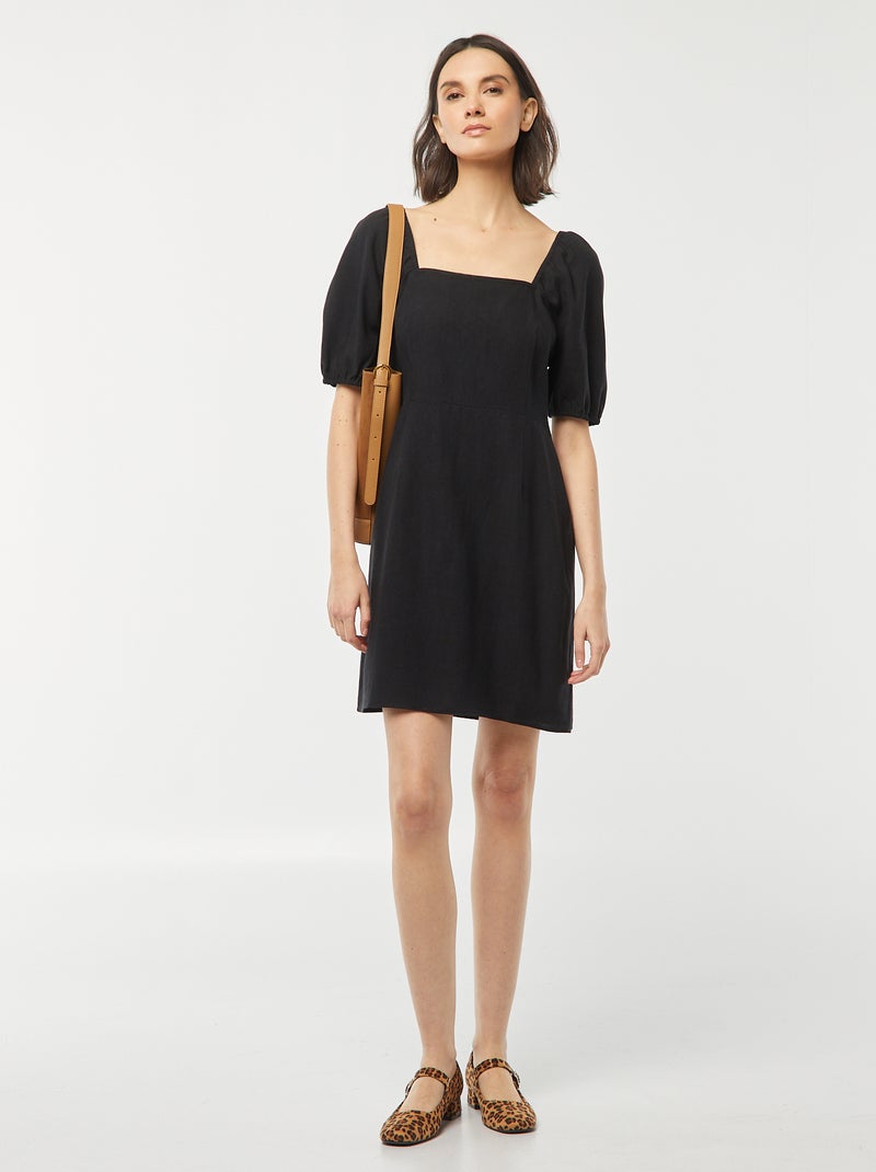 Robe courte évasée avec ouverture par un nœud au dos noir - Kiabi