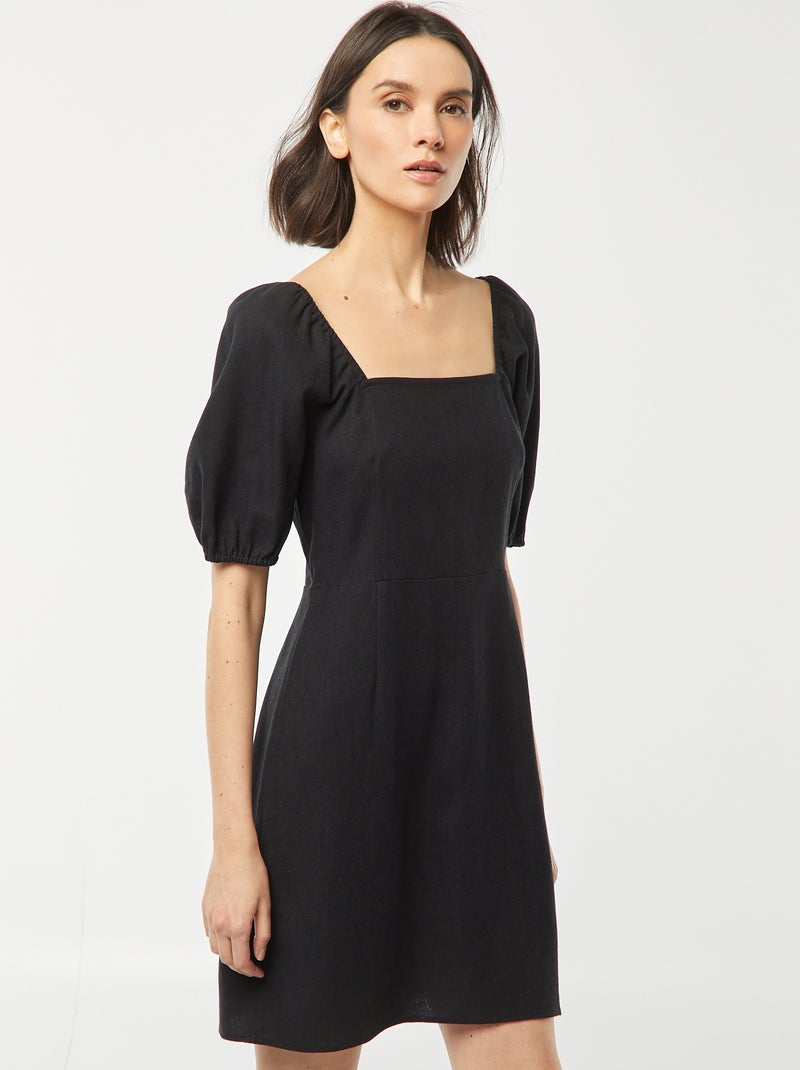 Robe courte évasée avec ouverture par un nœud au dos noir - Kiabi