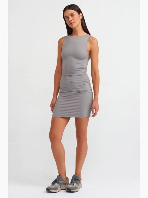 Robe courte moulante avec drapé dilvin - Kiabi Robe courte moulante avec drapé dilvin - Kiabi