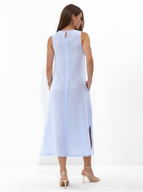 Robe de plage mi-longue en coton texturé avec fente - Kiabi Robe de plage mi-longue en coton texturé avec fente - Kiabi