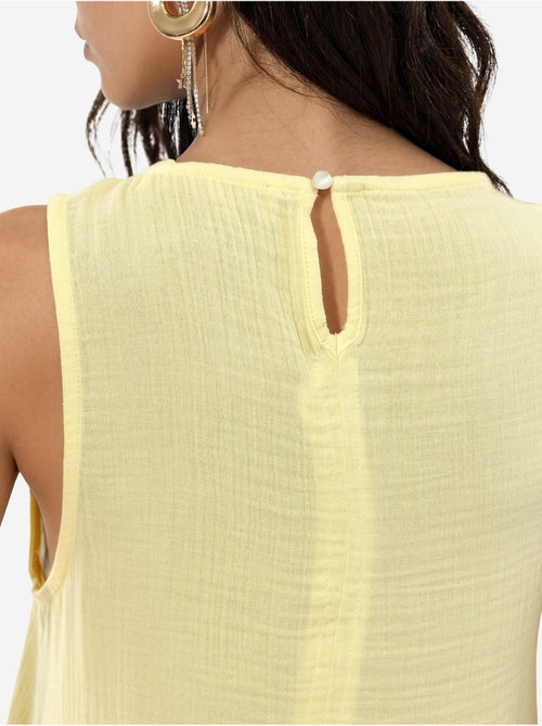 Robe de plage mi-longue en coton texturé avec fente - Kiabi Robe de plage mi-longue en coton texturé avec fente - Kiabi