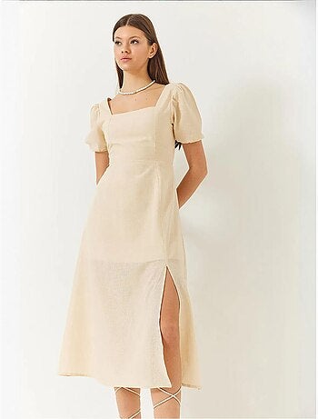 Robe en lin à manches bouffantes, col carré et fente dans le dos de bianco lucci