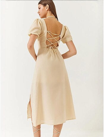 Robe en lin à manches bouffantes, col carré et fente dans le dos de bianco lucci