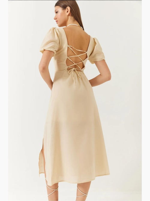 Robe en lin à manches bouffantes, col carré et fente dans le dos de bianco lucci - Kiabi Robe en lin à manches bouffantes, col carré et fente dans le dos de bianco lucci - Kiabi