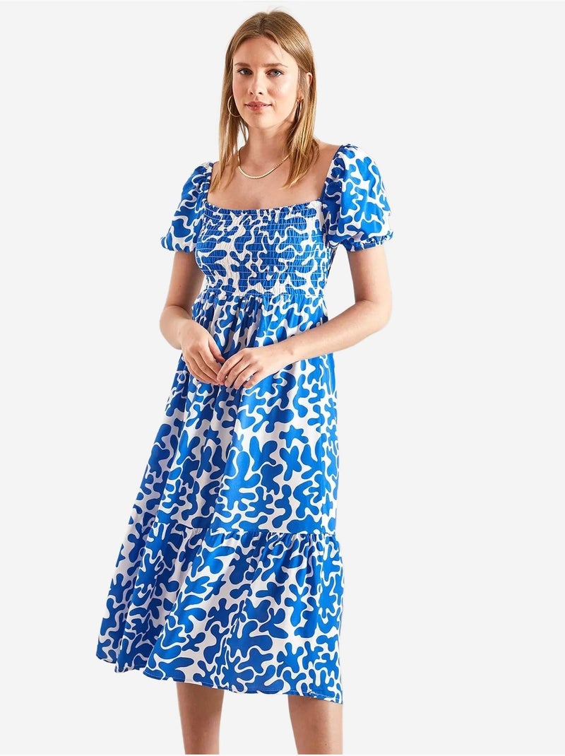 Robe évasée à motifs bianco avec taille smockée lucci Bleu clair - Kiabi