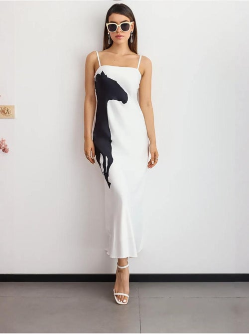 Robe longue à bretelles spaghetti et imprimé graphique - Kiabi Robe longue à bretelles spaghetti et imprimé graphique - Kiabi