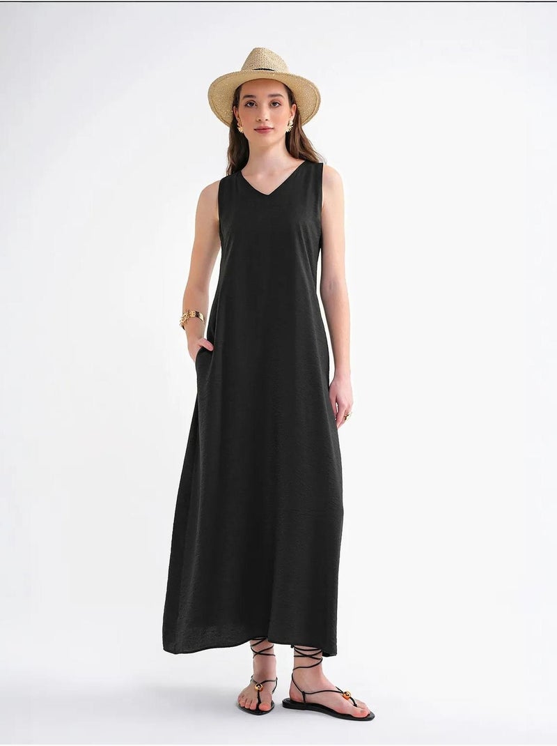 Robe longue sans manches à col en v et poches mixray Noir - Kiabi