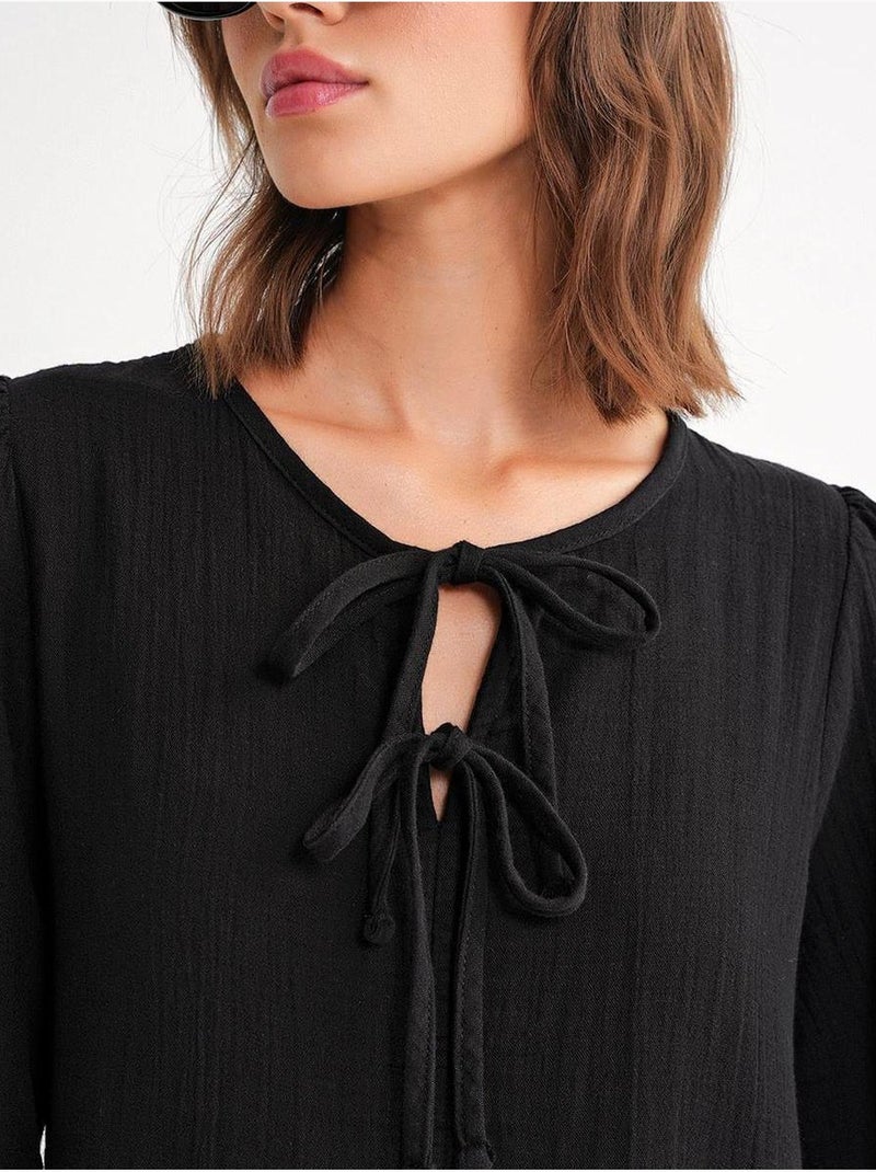 Robe mi-longue ample à col en v et fermeture à nouer mixray Noir - Kiabi